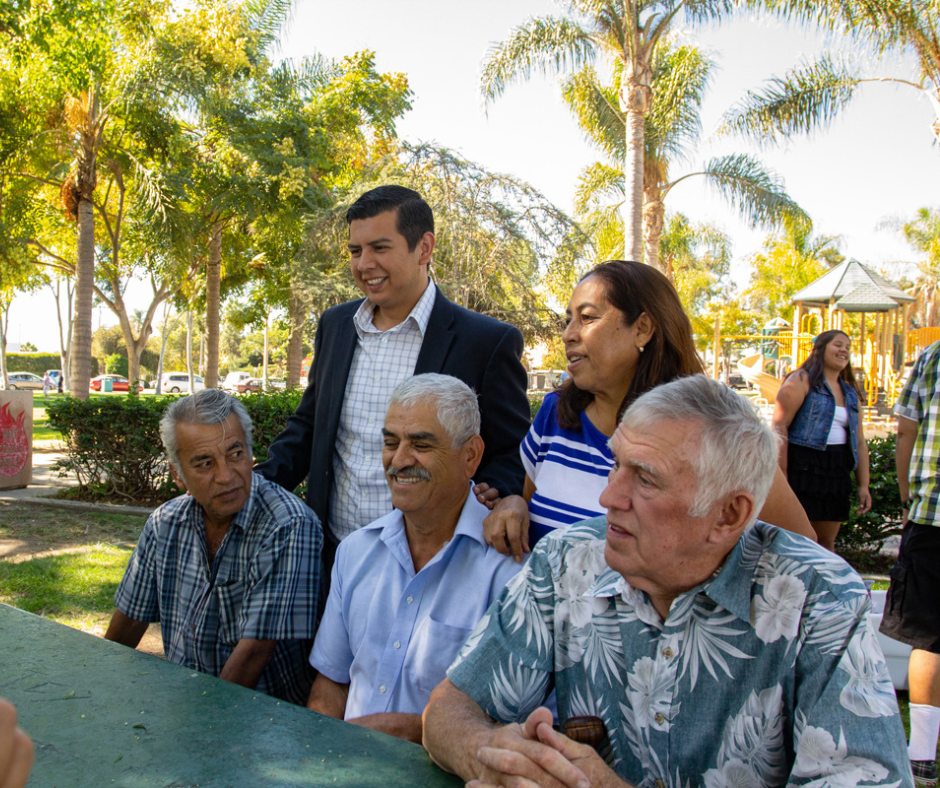 David Alvarez posing for photos with his supporters