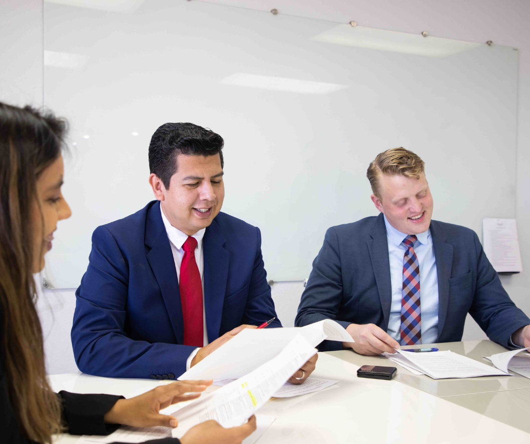 David Alvarez conducting business with staff